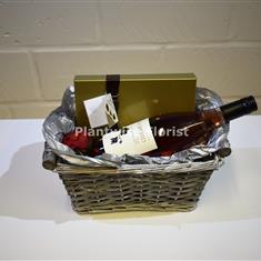 Rose Wine Hamper With Chocolates In A Gift Basket by Plantwise