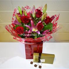 Romantic Red Rose and Pink Lily Handtied with Chocolates 
