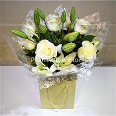 A Sympathy White Roses and Lilies Handtied Bouquet