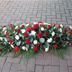 - Rose and Carnation Casket Spray in Red &amp; White