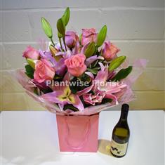 Pink Roses and Lilies Handtied with White Wine 