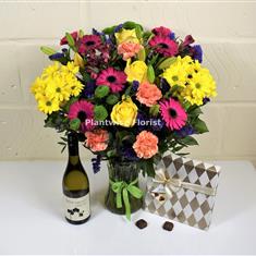 Colourful Vase Display With White Wine &amp; Chocolates