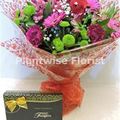 Romantic Valentine Handtied Bouquet of Flowers With Chocolates 