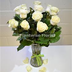 A Valentine's Day White Roses In Glass Vase