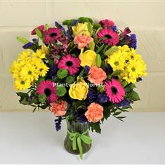 Colourful Vase Display Of Flowers