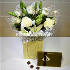 A White Roses and Lilies Handtied with Chocolates