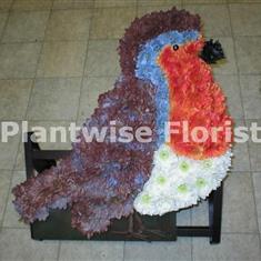 Flat Robin Wreath Made In Flowers For A Funeral
