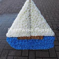 Flat Sailing Boat Wreath Made in Flowers For A Funeral