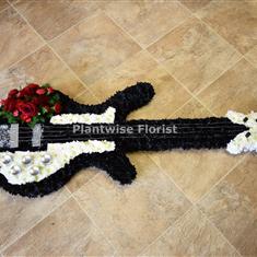 Electric Guitar Made In Flowers For A Funeral Service