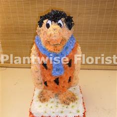 Fred Flintstone Specialist Funeral Flowers Wreath 