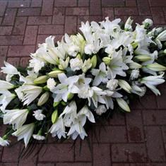 A Lily and Carnation Casket Spray CodeCA39A