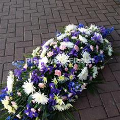 White, Pink &amp; Blue Mixed Flower casket Spray Code CA40A