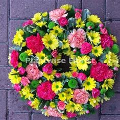 Bright Coloured Loose Wreath With Carnations and Chrysanths