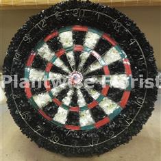 Dartboard Wreath Made In Flowers For A Funeral