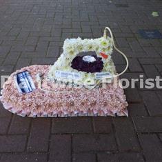 Steam Iron and Ironing Board Made in Flowers For A Funeral
