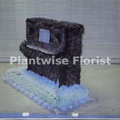 Upright 3D Piano Made In Flowers For A Funeral Service
