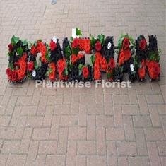 Gothic Style Floral letters Made In Flowers For A Funeral