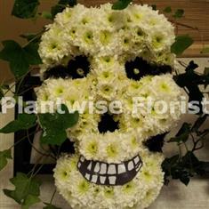 Skull Made In Flowers For A Funeral