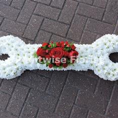 Large Size Spanner Wreath Made In Flowers For A Funeral
