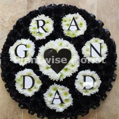 Black Sundial Puzzle Made In Flowers For Funeral