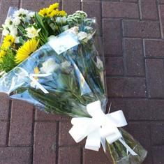 Funeral Flowers In Cellophane