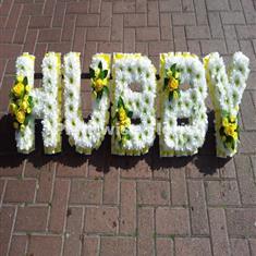 7 HUBBY Letters Made In Flowers for a Funeral with Clusters