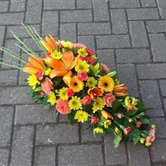 Germini and Lily Funeral Oasis Spray in Orange and Yellow