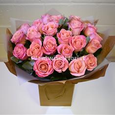 A Valentine's Deluxe Pink Roses Handtied 